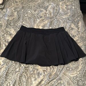 Lululemon High Rise Side Pleated Skirt with shorts and pockets